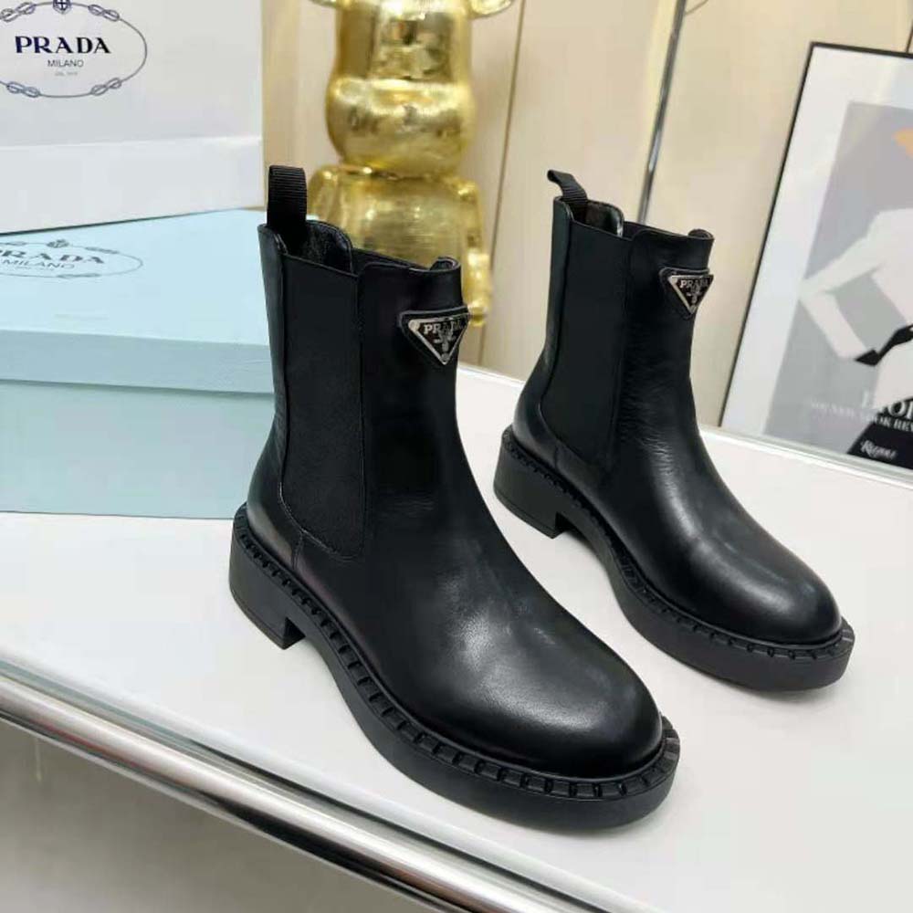 Top-down detail showing elastic gussets on Prada Women Brushed Leather Booties-Black