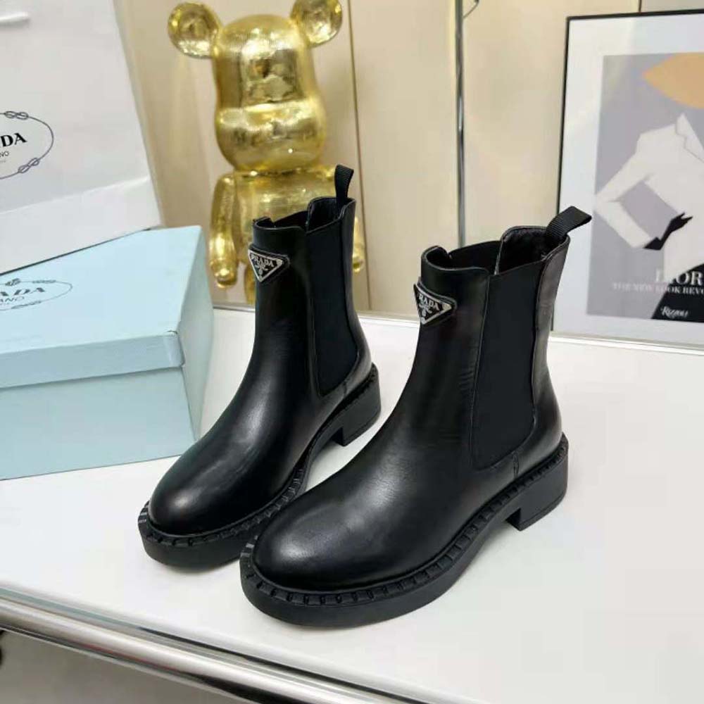 Close-up of brushed leather texture on Prada Women Brushed Leather Booties-Black