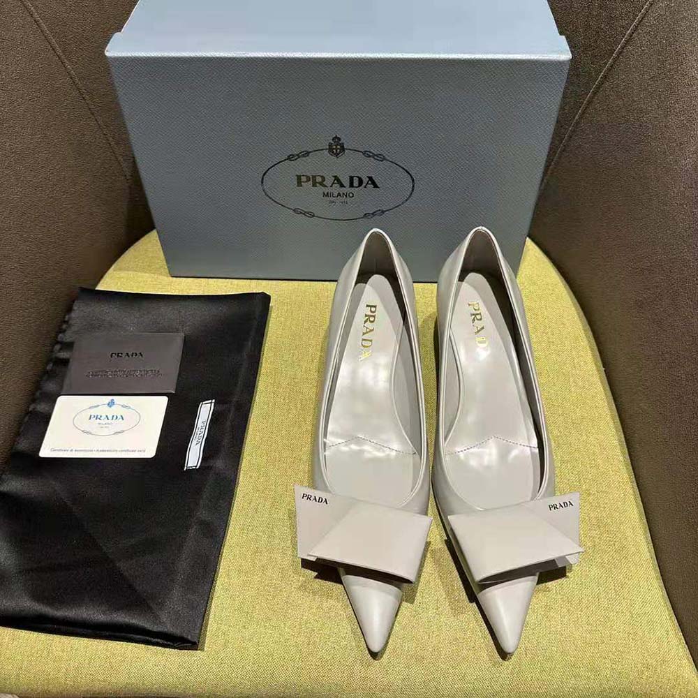 Close-up of brushed gray leather and Prada logo detail