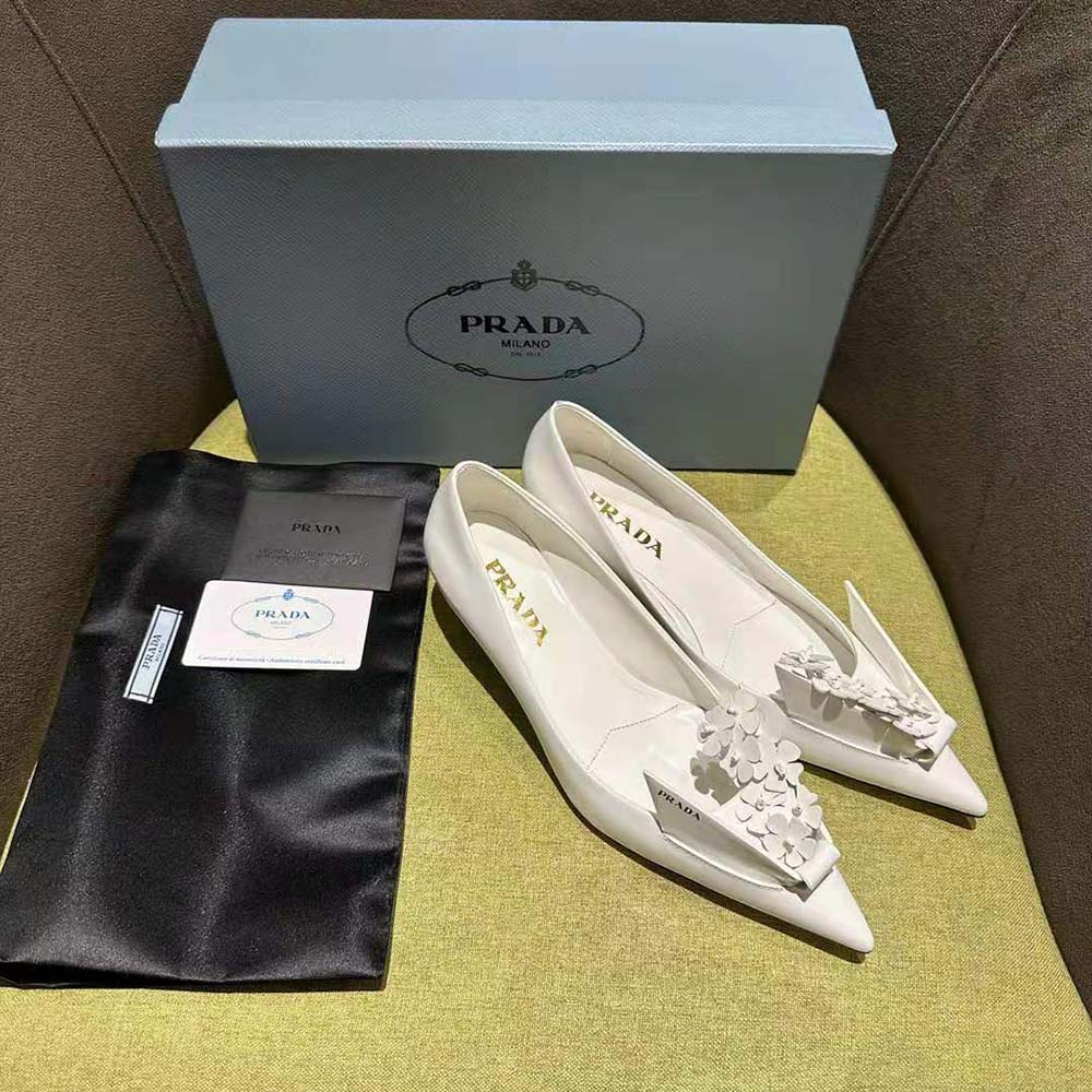 Rear view showing heel detail of Prada Women Brushed Leather Pumps white