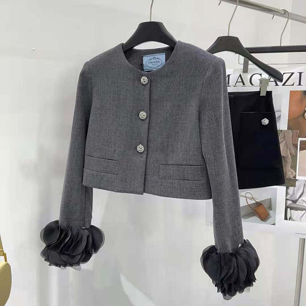 Close-up on feather trim collar of Prada Women Feather-trimmed Wool Jacket