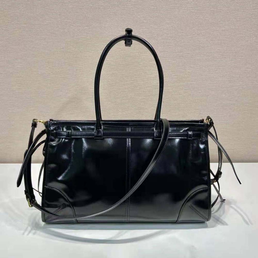 Interior shot of Prada Women Large Leather Handbag-Black displaying organized compartments