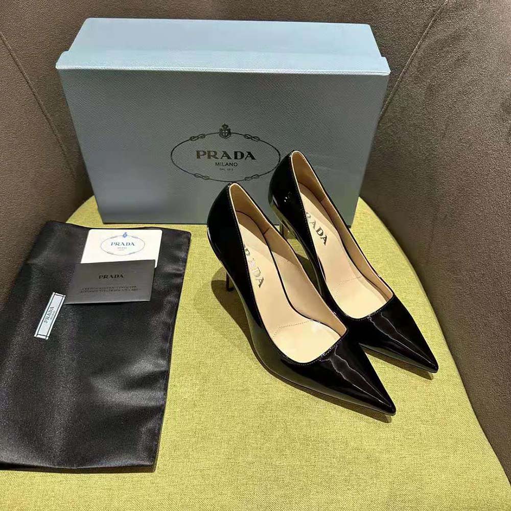 Rear angle of Prada Women Patent Leather Pumps-Black showing heel height
