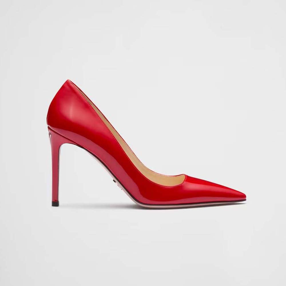 Side profile of Prada Women Patent Leather Pumps-Red showing heel height