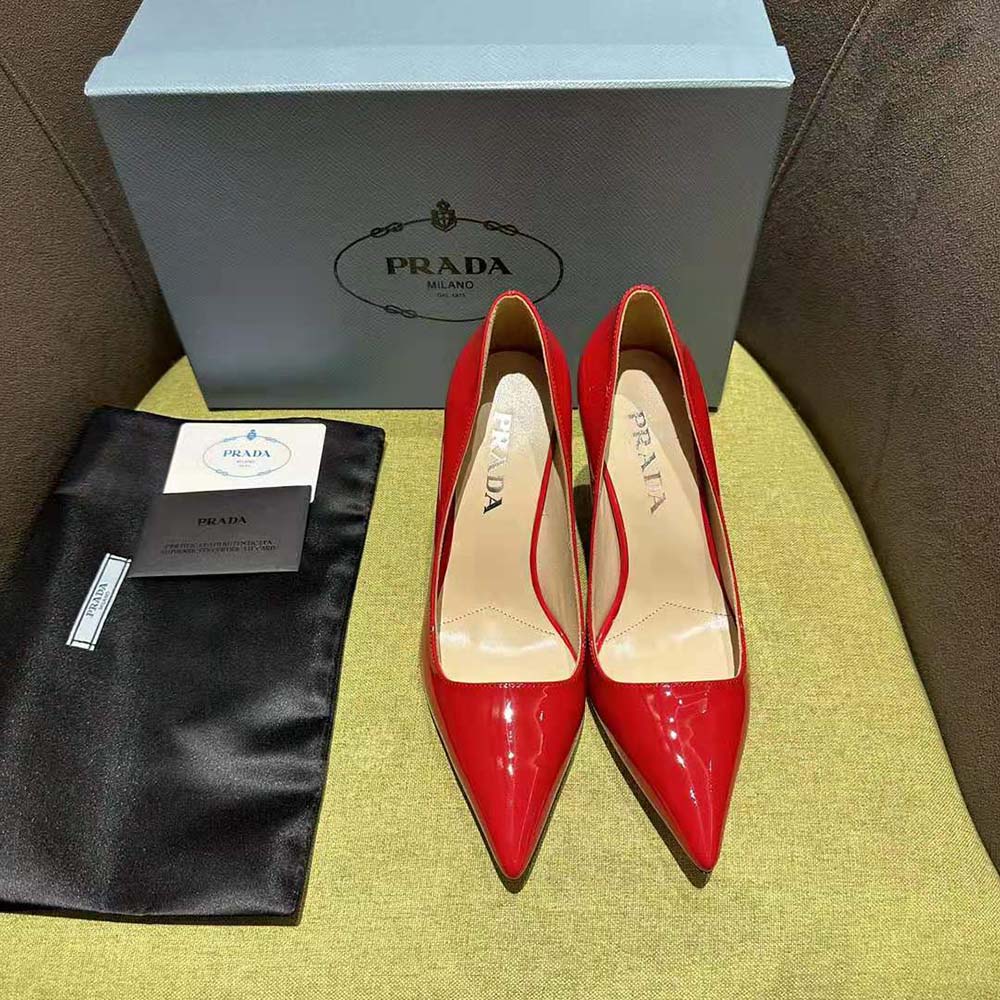 Close-up of glossy red patent leather on Prada Women Patent Leather Pumps-Red