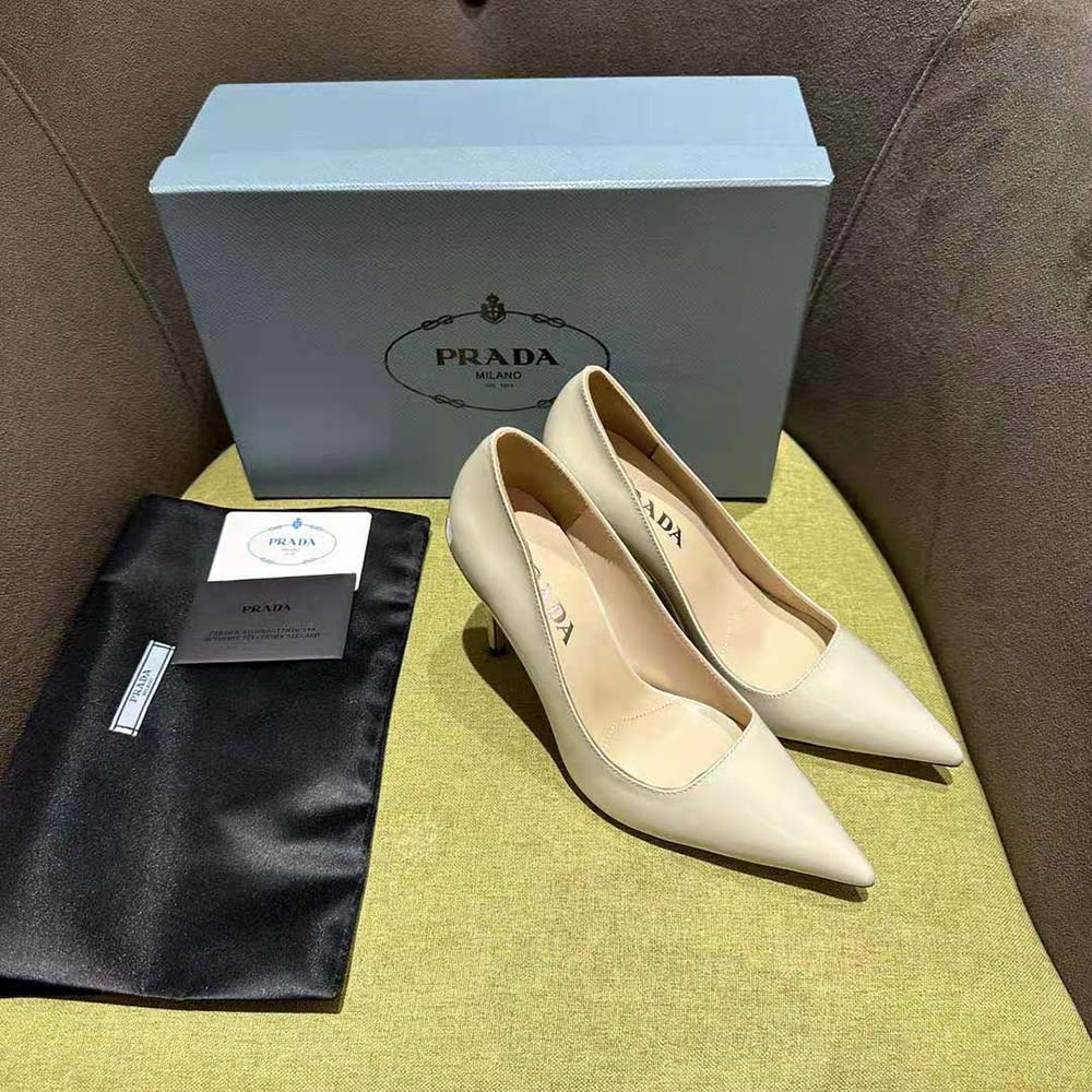 Top view detailing slip-on design of Prada Women Patent Leather Pumps-White