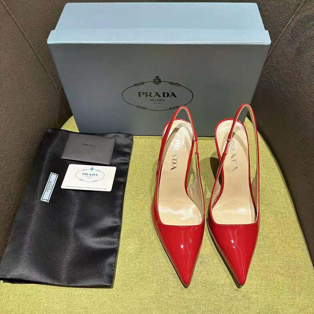 Close-up of glossy patent leather and signature buckle on Prada slingbacks