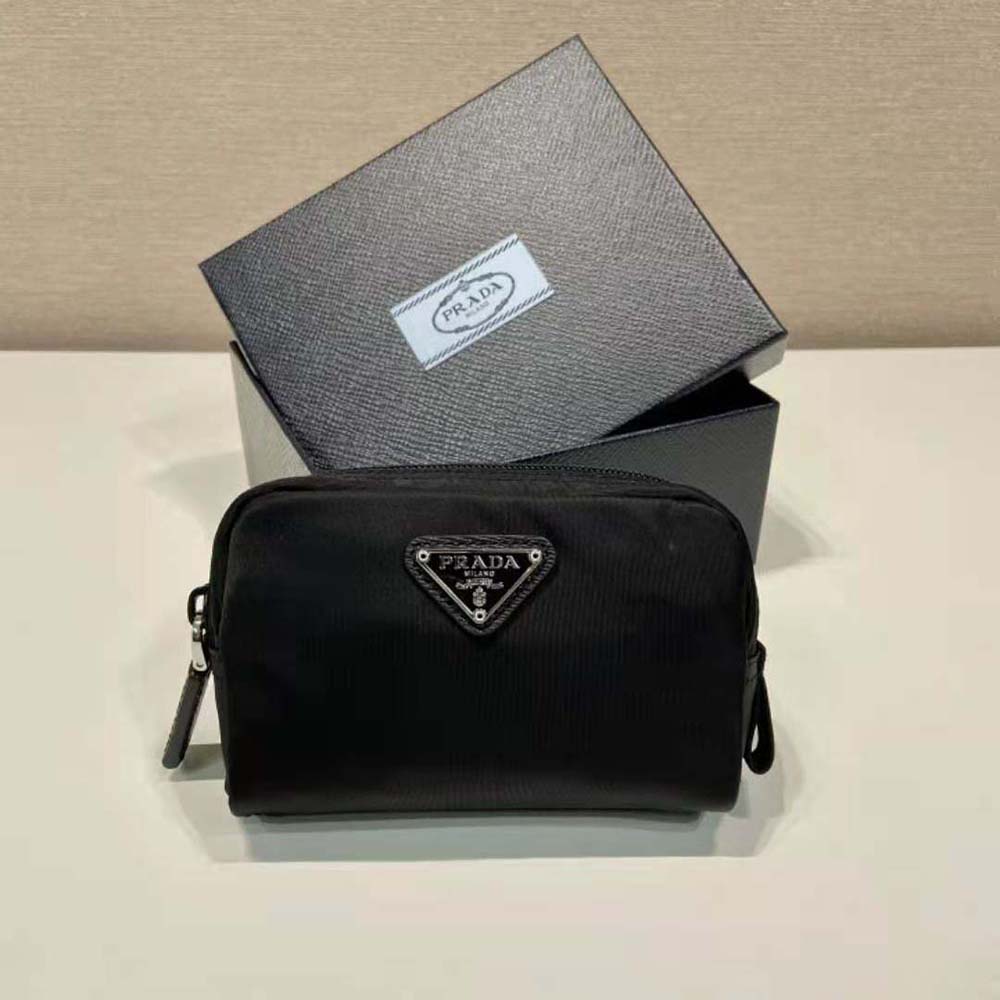 Close-up of silver-tone closure on Prada Women Small Re-Nylon Wallet-Black