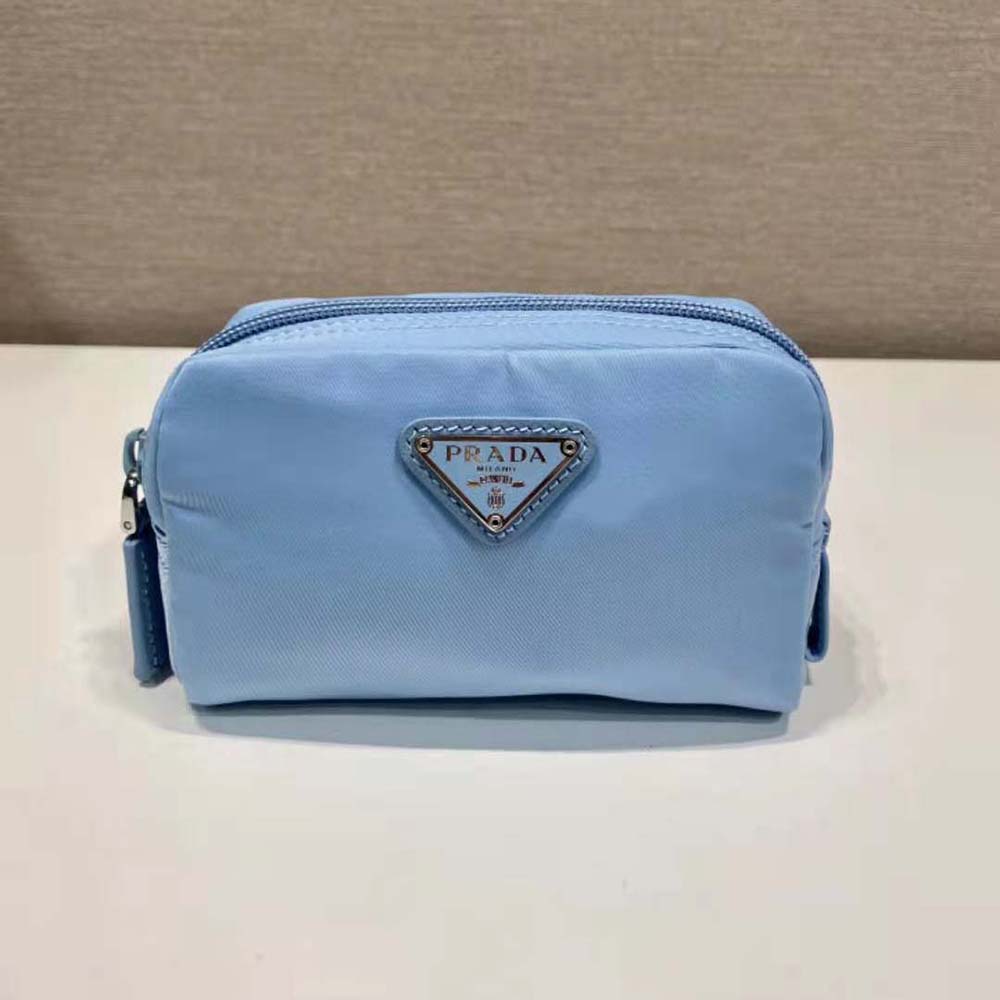 Opened Prada Women Small Re-Nylon Wallet-Blue displaying card slots and compartments