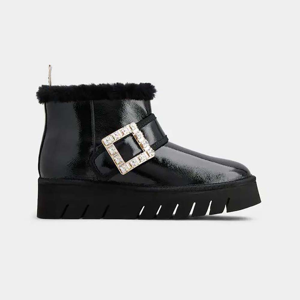 Side profile of Roger Vivier Women Viv’ Winter Fur Strass Buckle Ankle Boots black patent leather