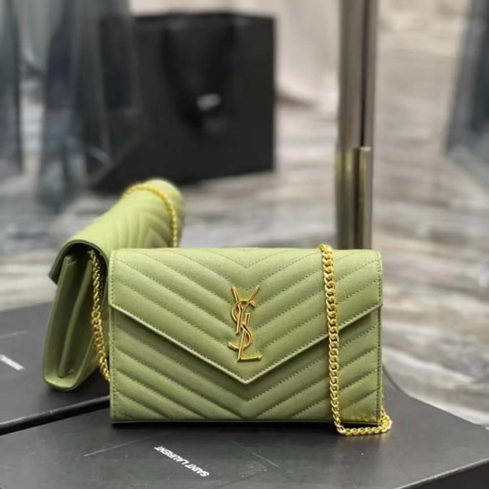 Close-up of YSL monogram and gold chain on Saint Laurent Chain Wallet