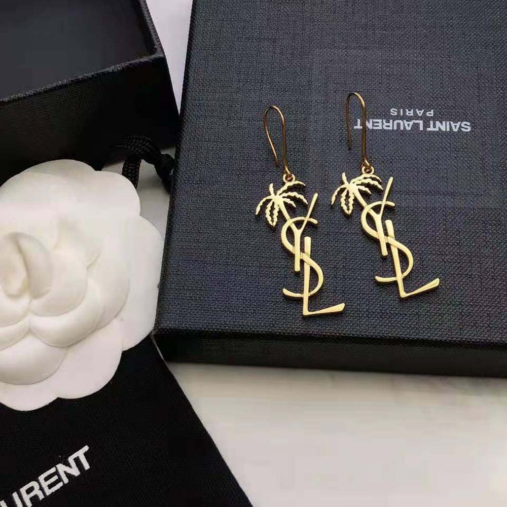 Side profile showing medium drop length of Saint Laurent YSL Cassandre Palm Earrings