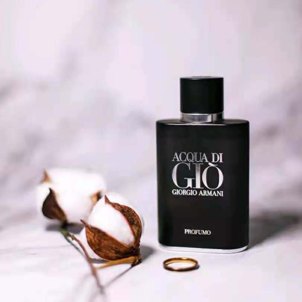 Close-up of black bottle and Giorgio Armani branding details