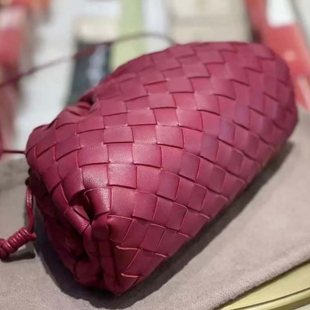 Detail of gold-tone hardware on Bottega Veneta Women Mini Pouch Soft Voluminous Clutch