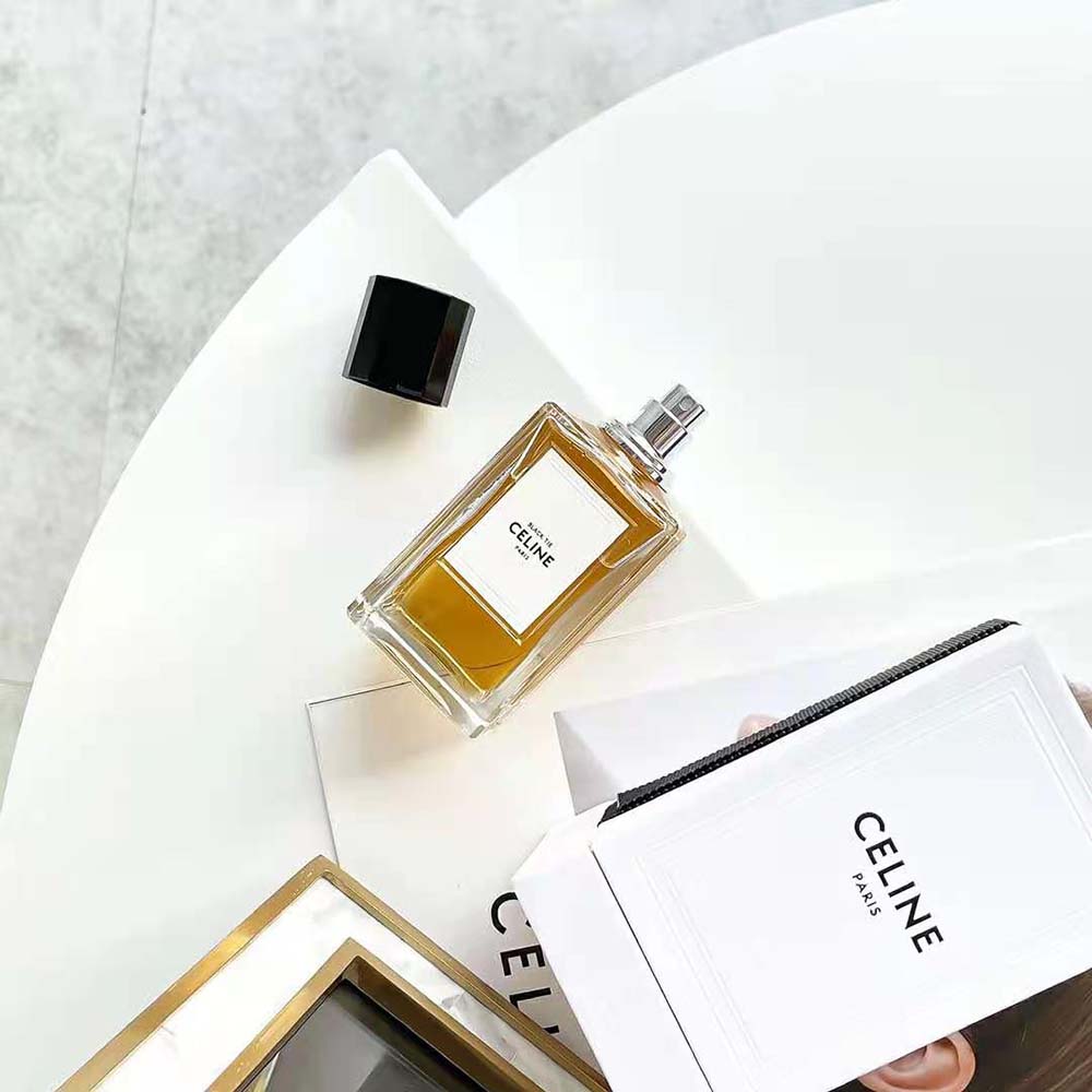 Angled shot highlighting black and gold design of Celine Unisex Black Tie Eau de Parfum