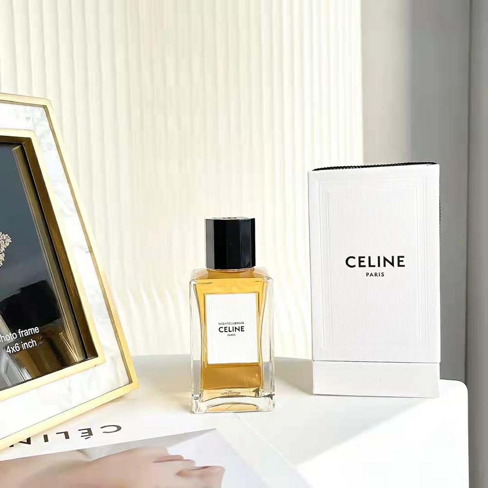 Close-up of gold cap and logo on Celine Nightclubbing perfume