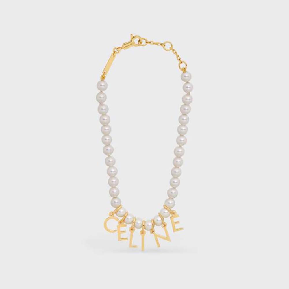 Close-up of Celine Women Paris Pearl Bracelet gold clasp and pearls