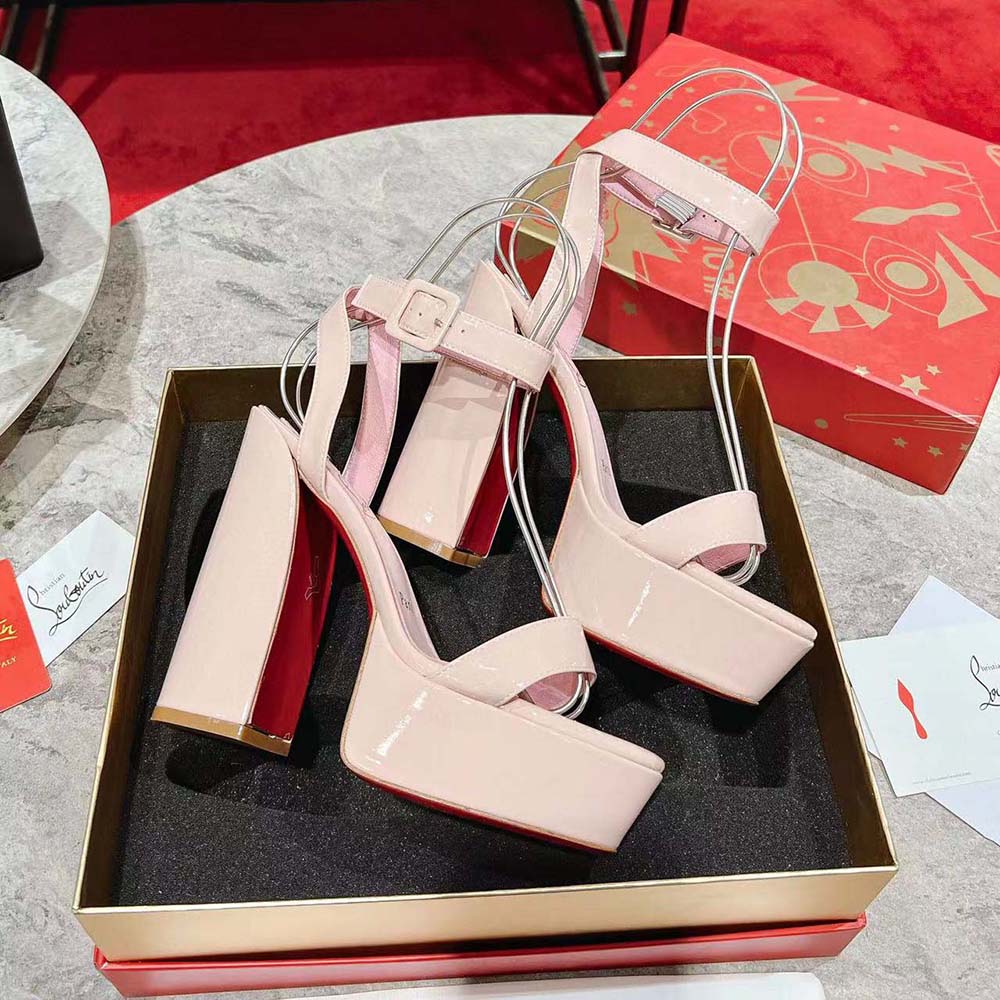 Side profile showing slender 130 mm heel of Christian Louboutin Movida Sabina sandals