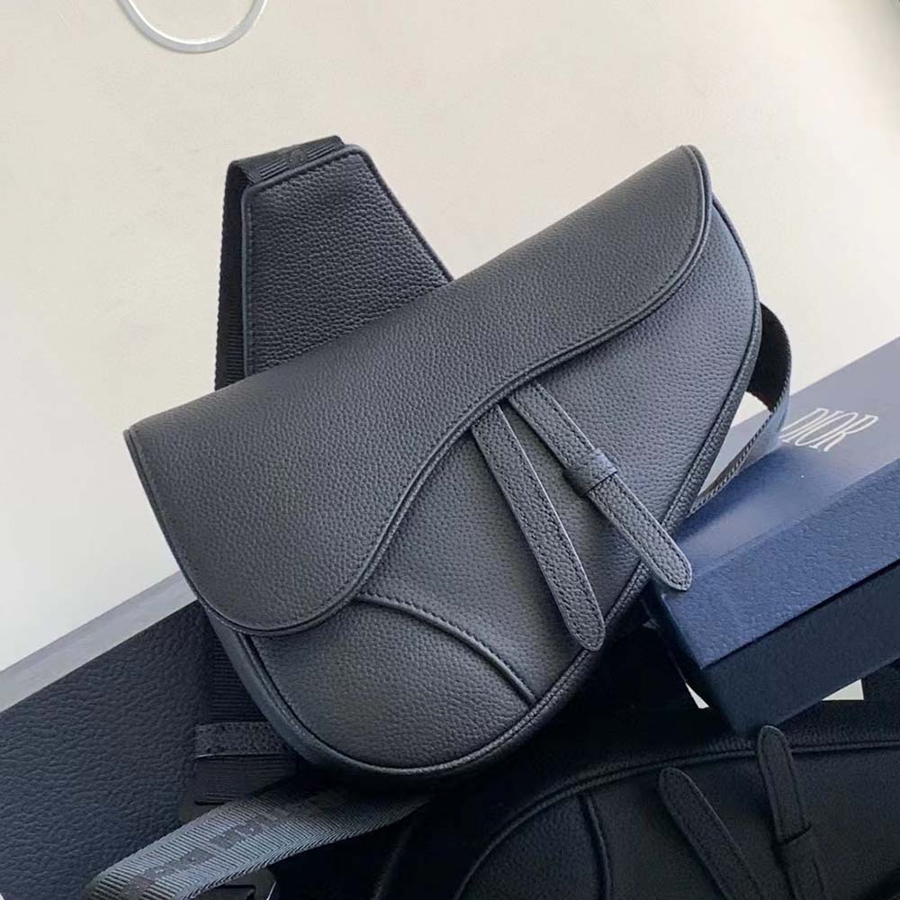 Close-up of silver hardware on Dior Men Essentials Saddle Bag