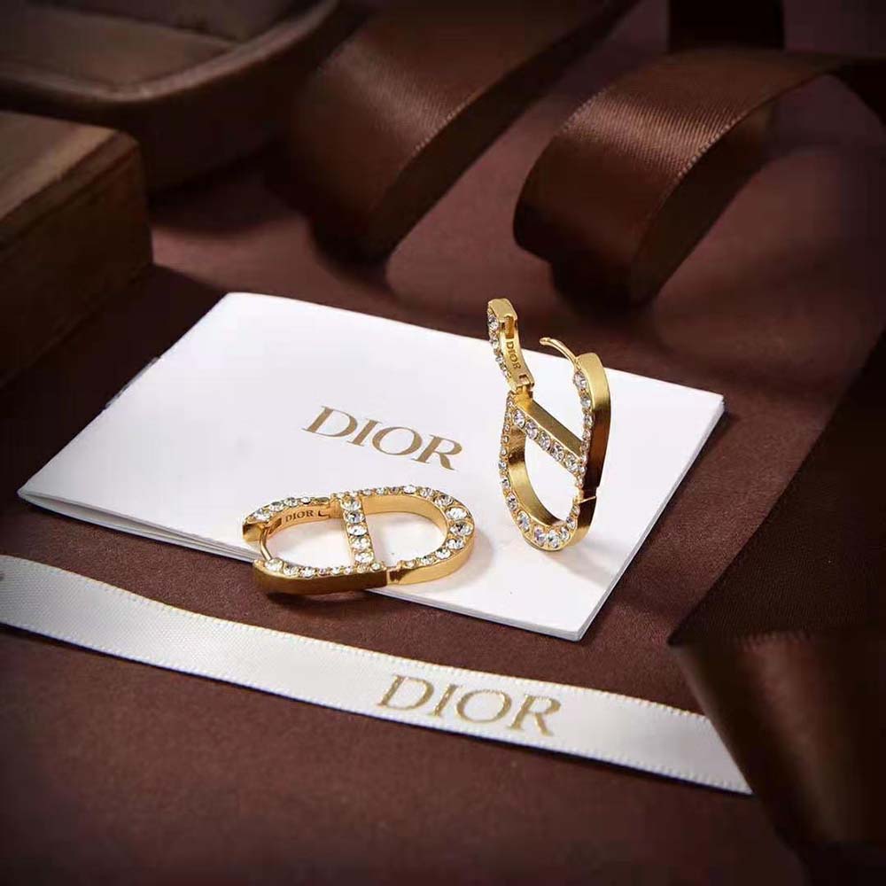 Side angle showing gold-finish metal and closure of Dior Women 30 Montaigne Earrings