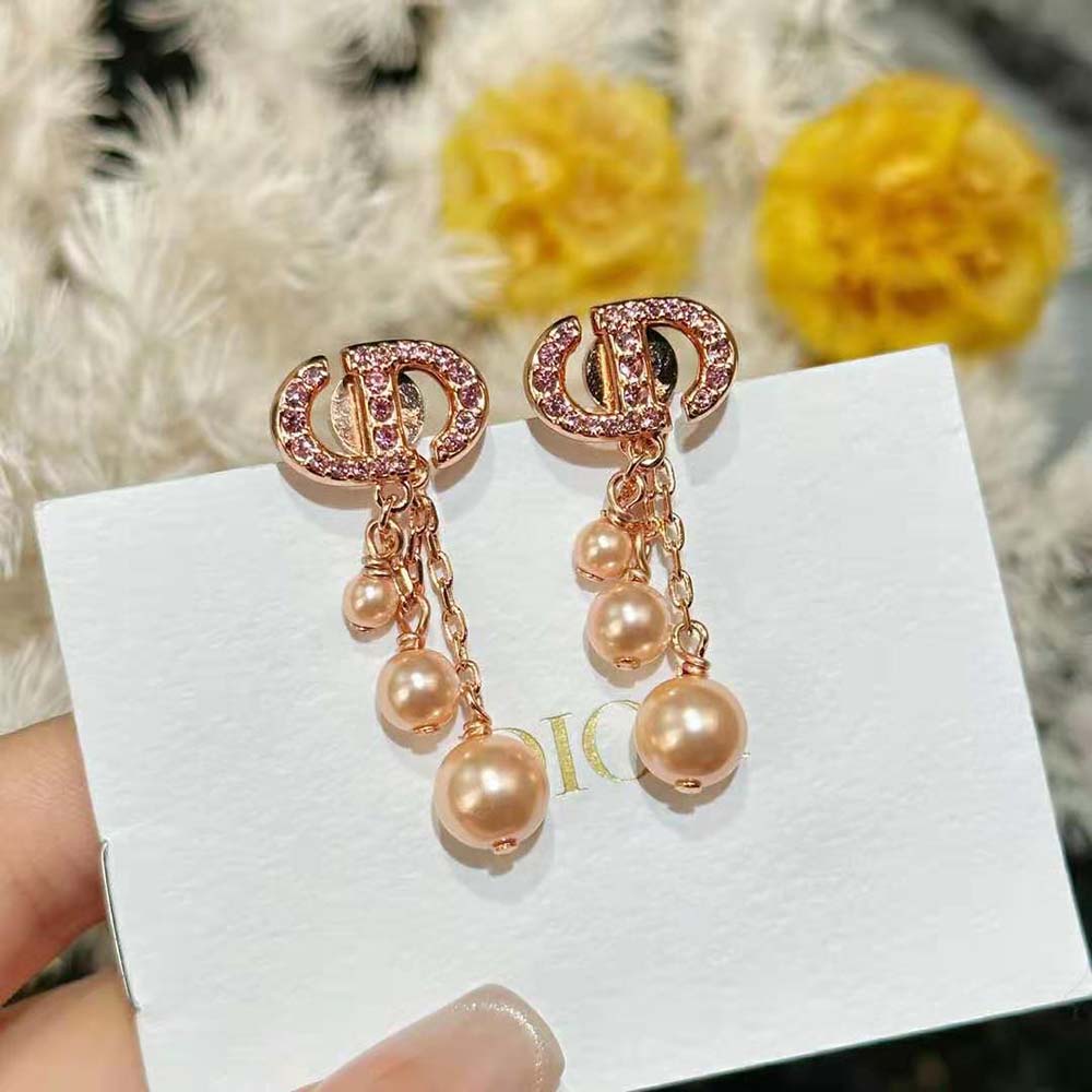 Dior Women CD Navy Earrings detail on pink-finish metal and signature logo