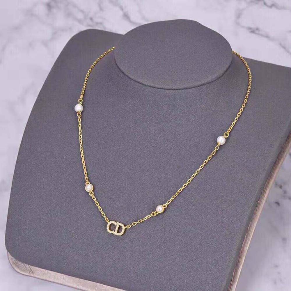 Close-up of crescent pendant on Dior Women Clair D Lune Necklace