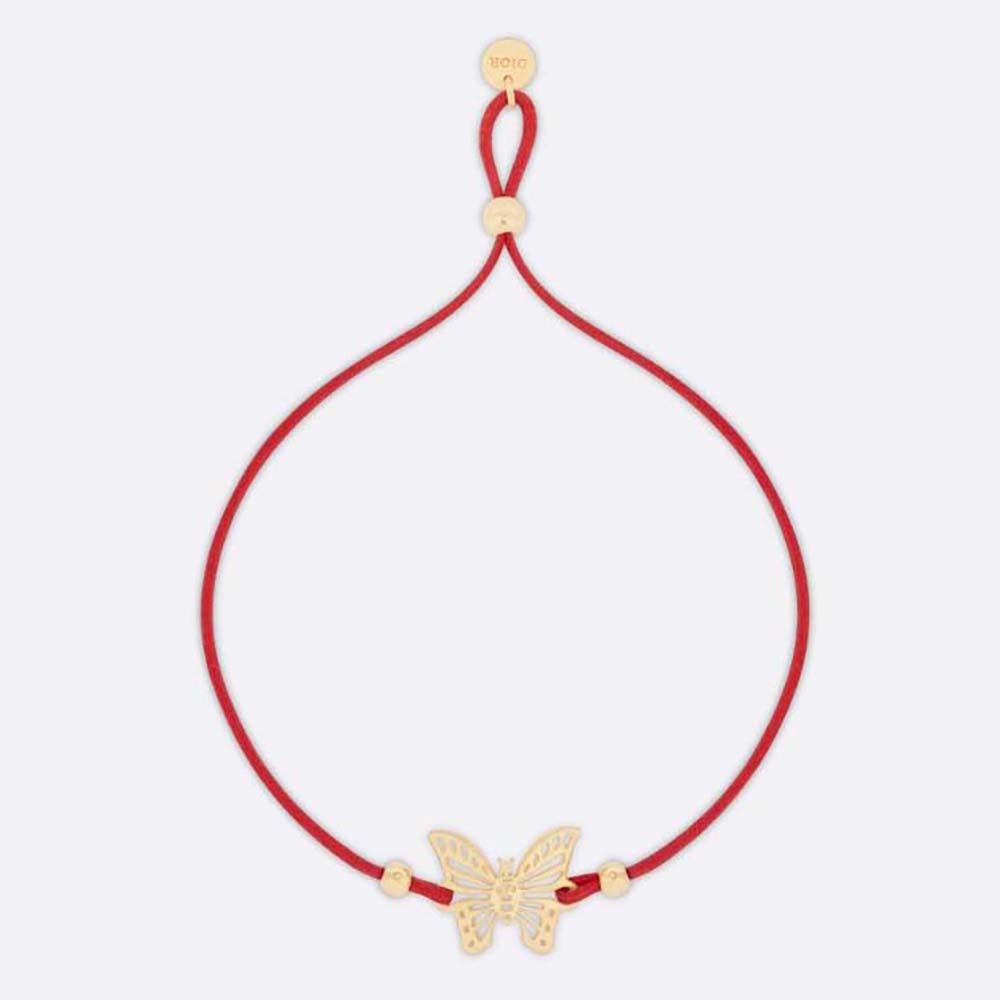 Close-up of Dior Women Diorelita Bracelet gold-finish clasp and red cotton band