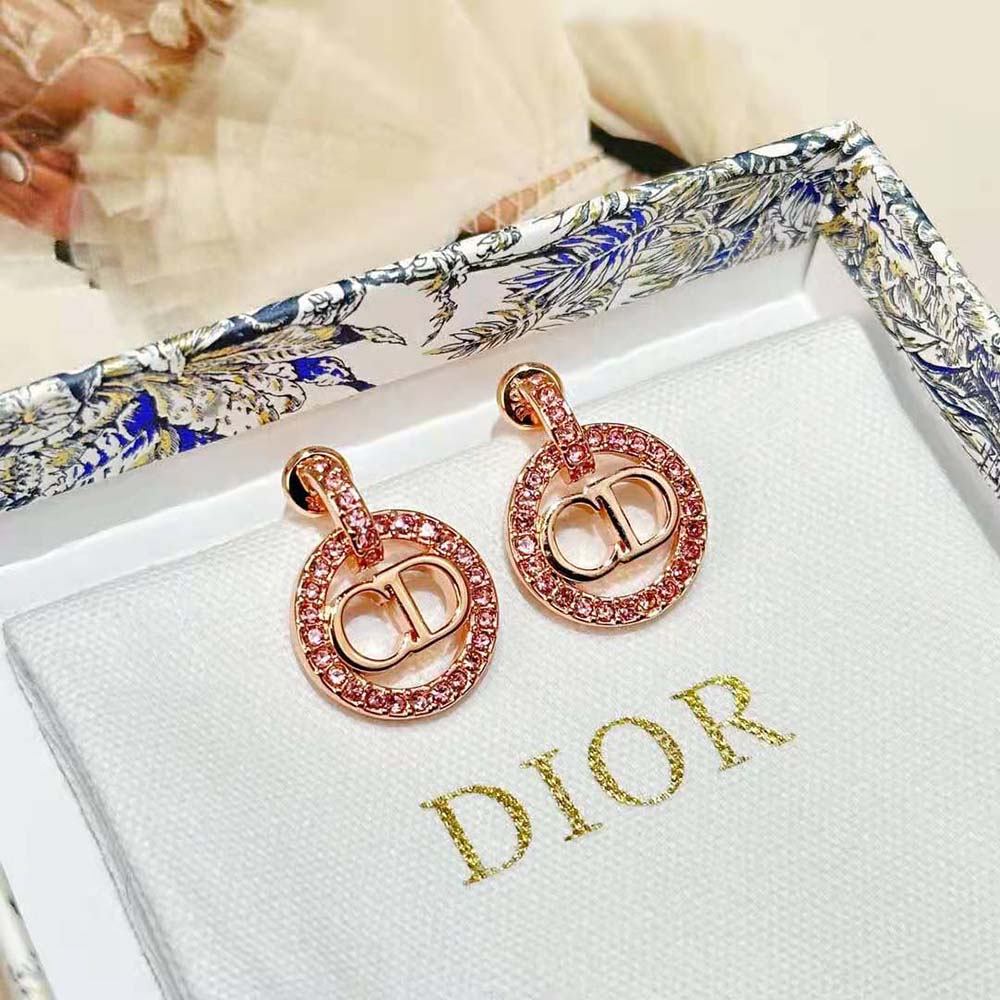 Side angle showing clasp and pink finish on Dior Women Petit CD Earrings