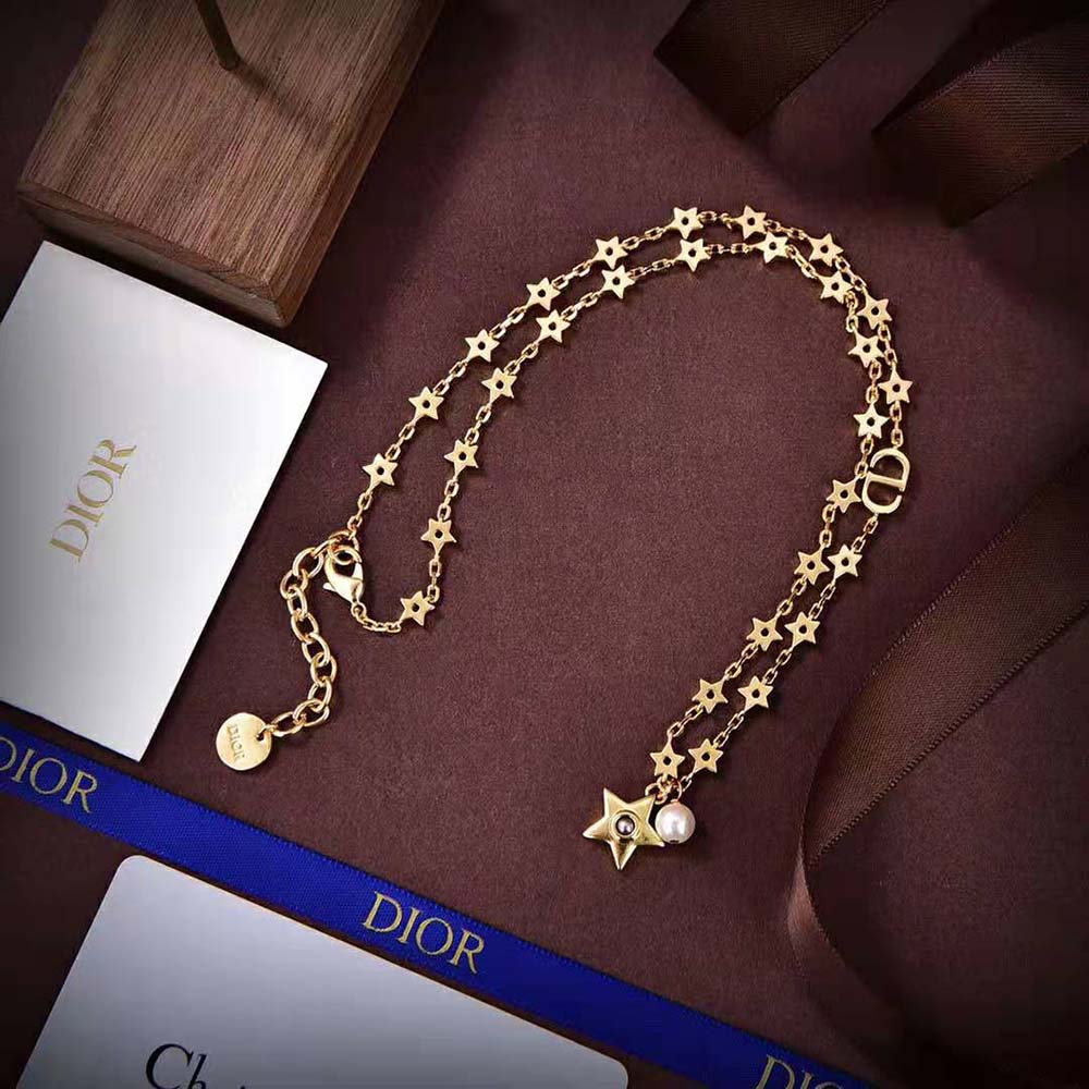 Full view of Dior Women Star Necklace Gold-Finish Metal on display
