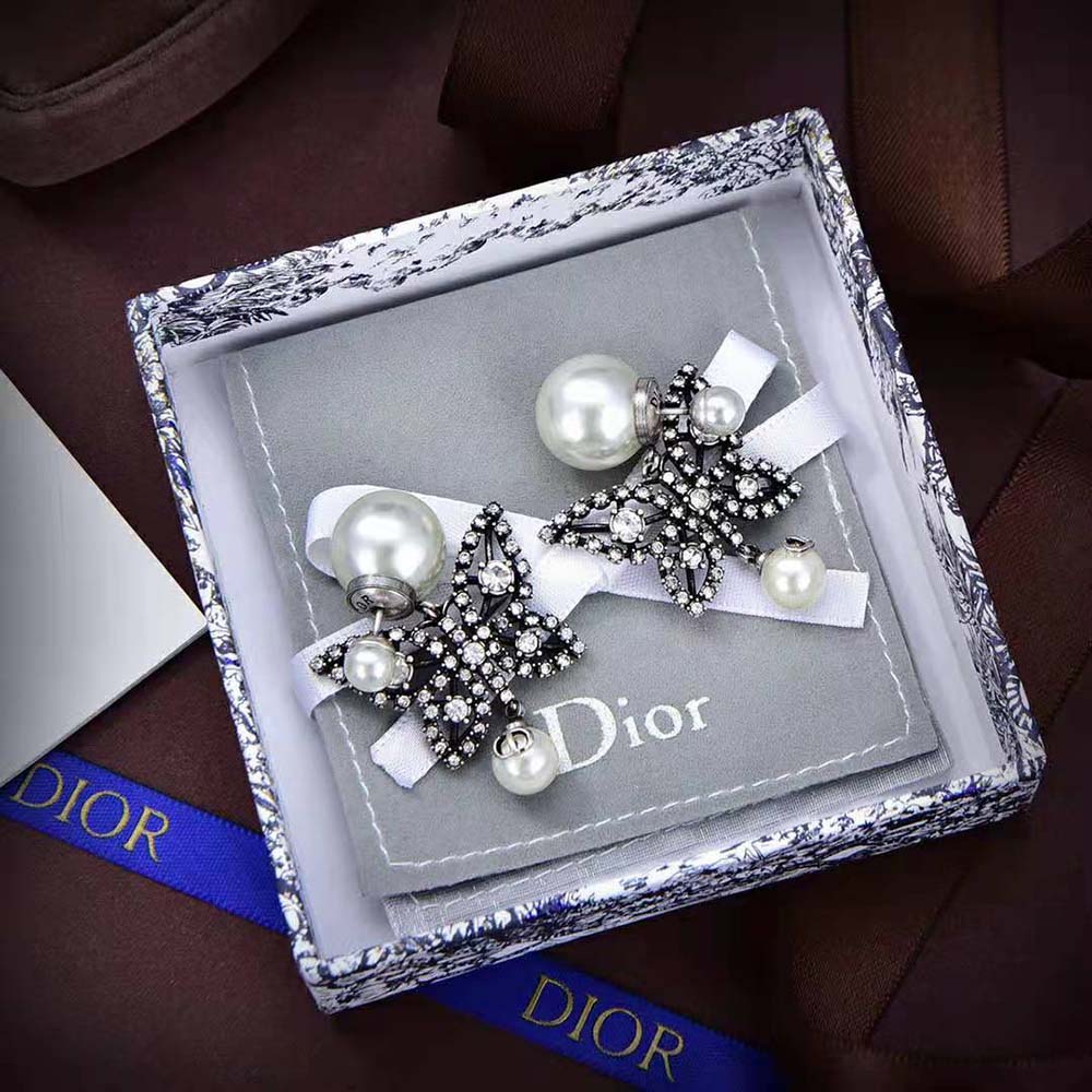 Close-up detail of antique silver finish on Dior Women Tribales Earrings