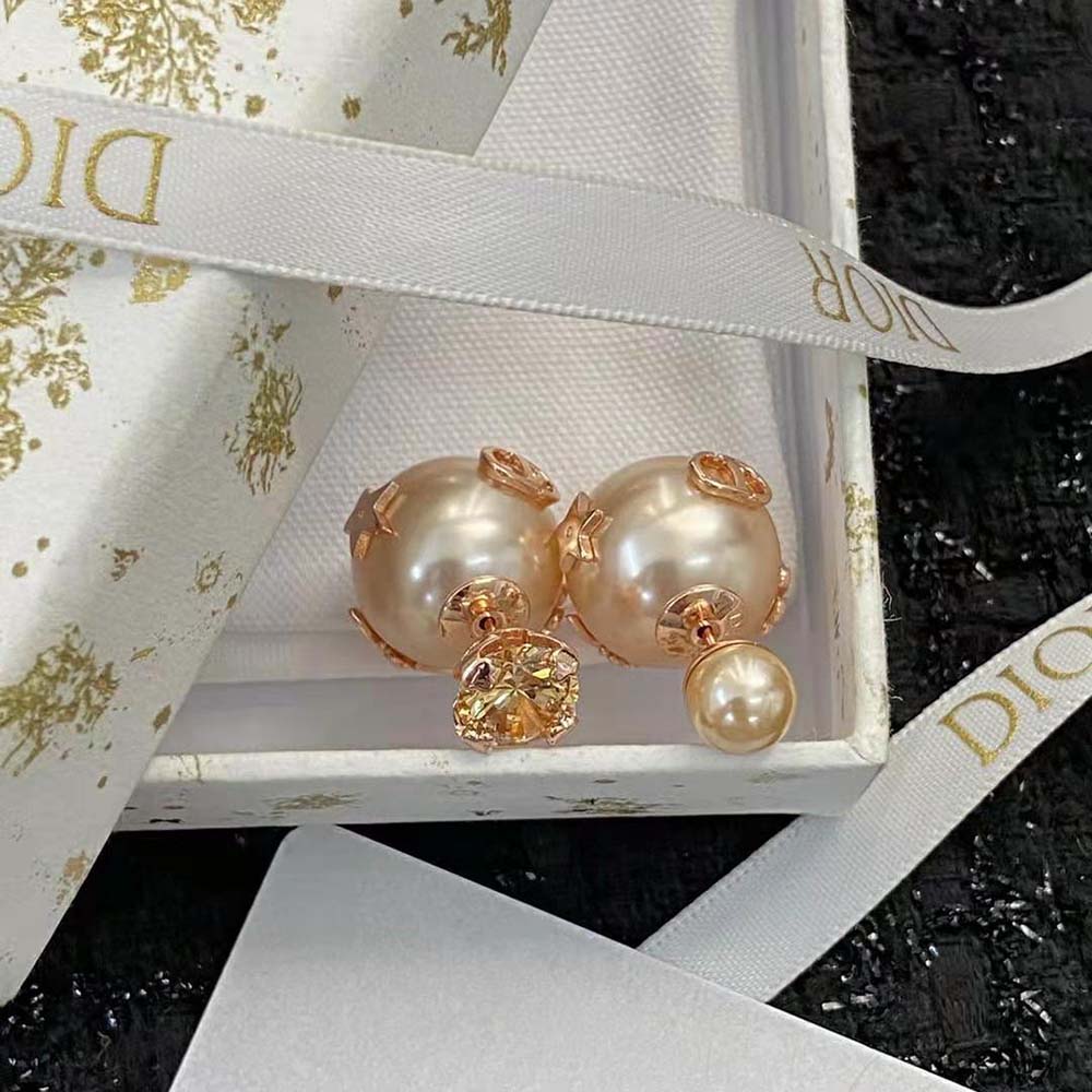 Side angle showing asymmetrical design of Dior Women Tribales Earrings