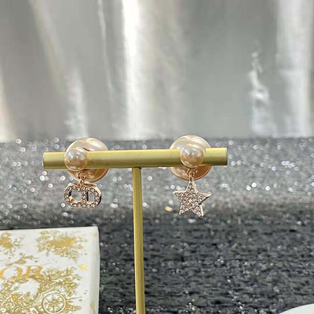 Side angle showing push-back closure on Dior Women Tribales Earrings
