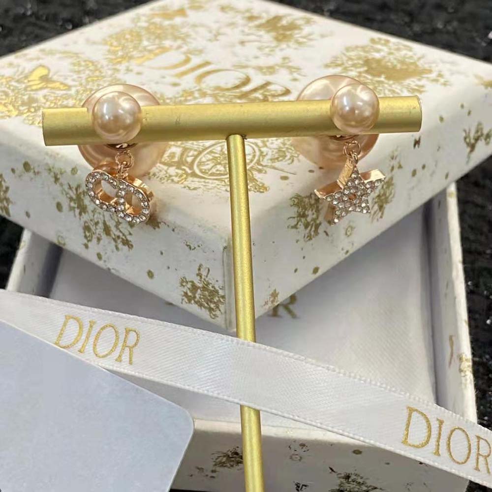 Close-up detail of pink resin pearls on Dior Women Tribales Earrings