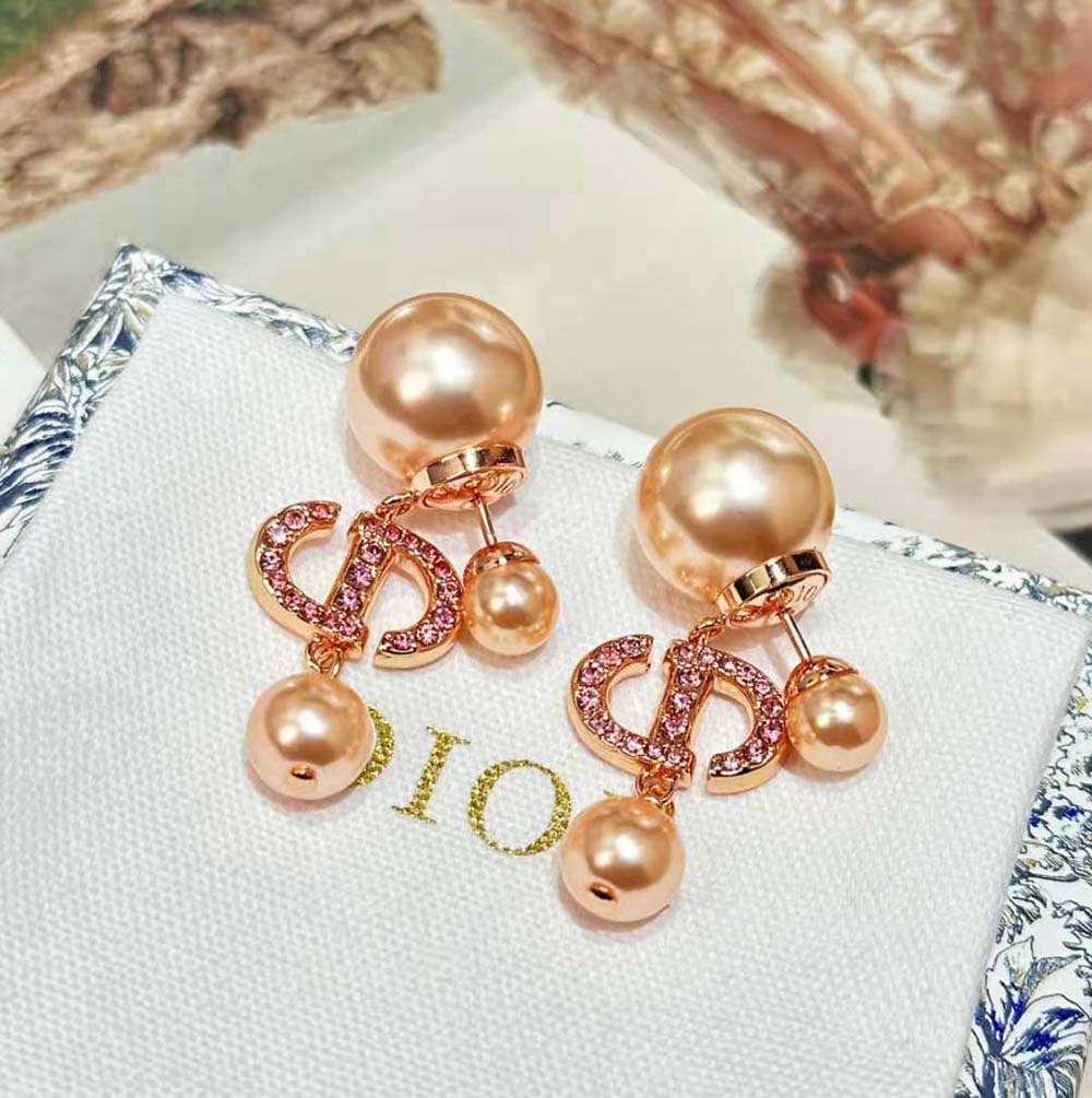 Side profile showcasing double-sided silhouette of Dior Women Tribales Earrings