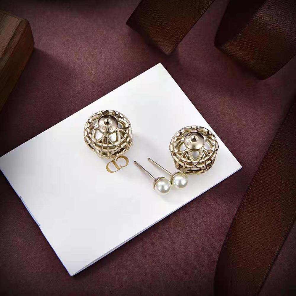Side angle showing gold-finish metal and closure of Dior Women Tribales Earrings