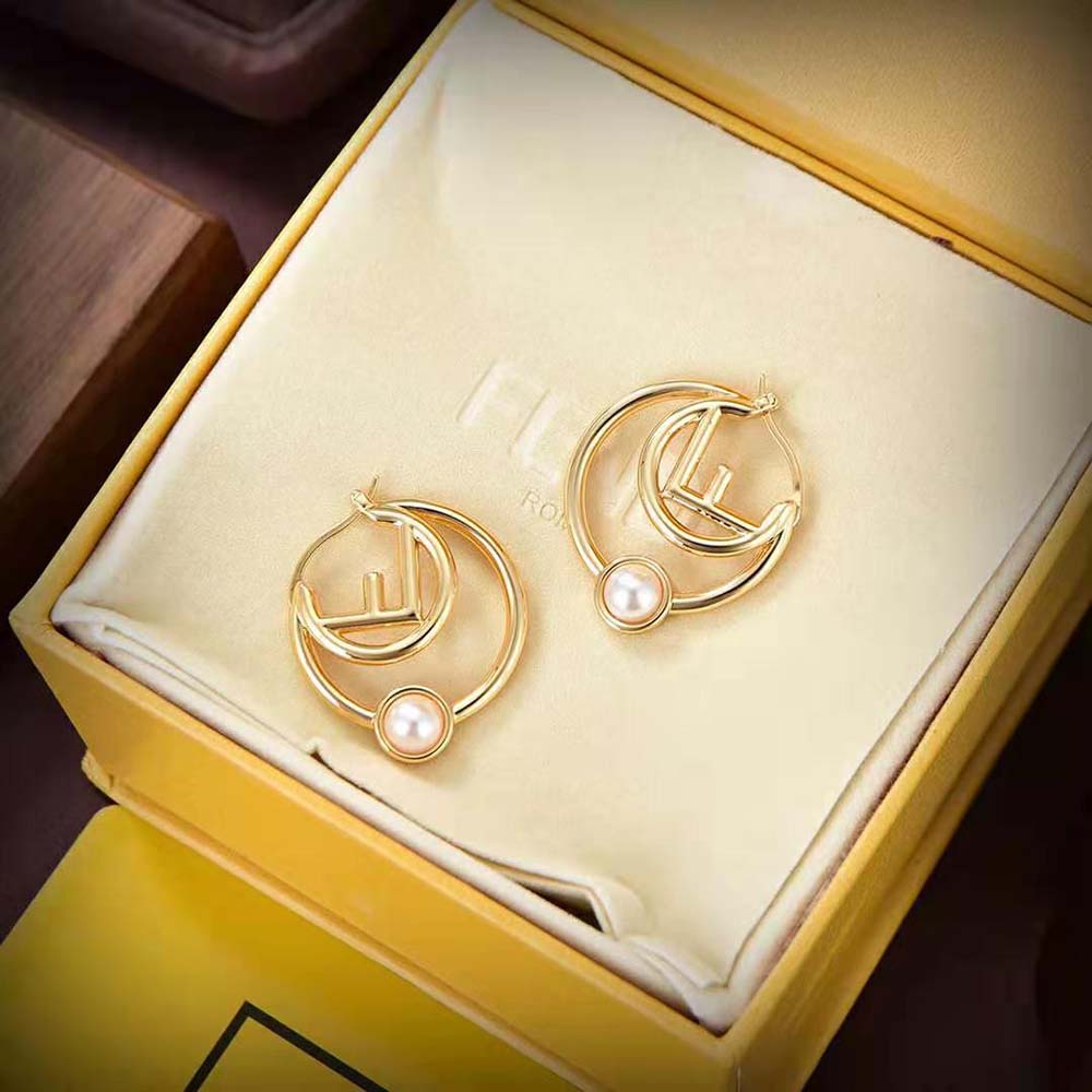 Side angle showing push-back closure on Fendi Women F is Fendi Earrings Gold-colored Metal