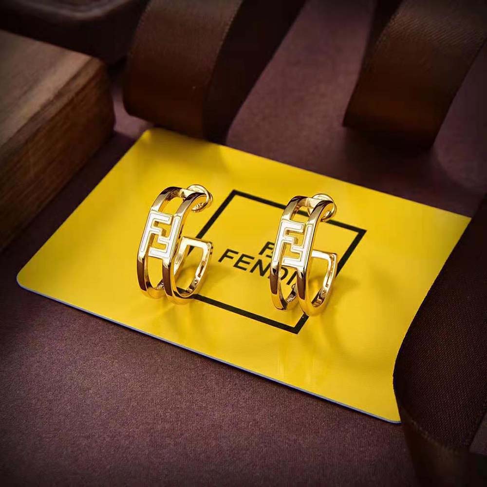 Close-up of gold finish and secure closure on Fendi Women Forever Fendi Earrings