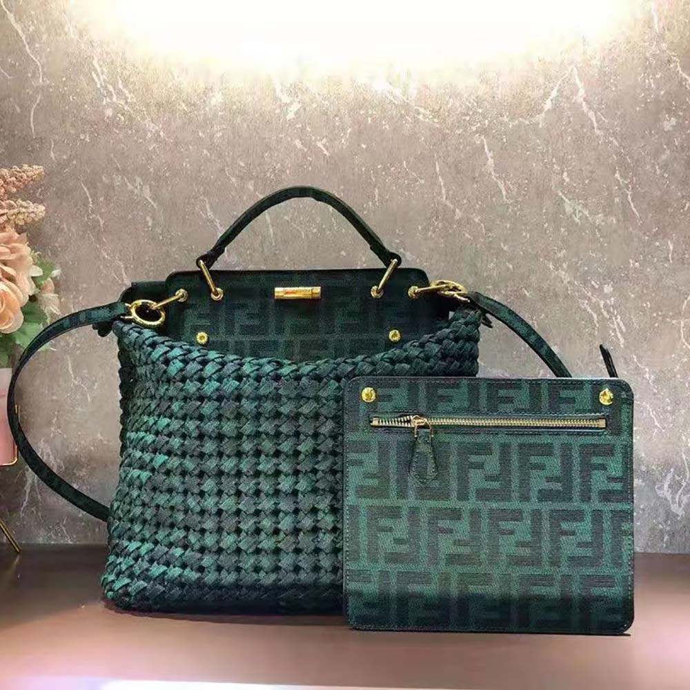 Close-up of gold-tone closure on Fendi Peekaboo Iconic Medium Jacquard Bag