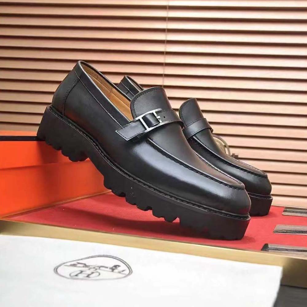 Close-up on black calf leather texture of Hermes Men Happen Derby Shoe-Black