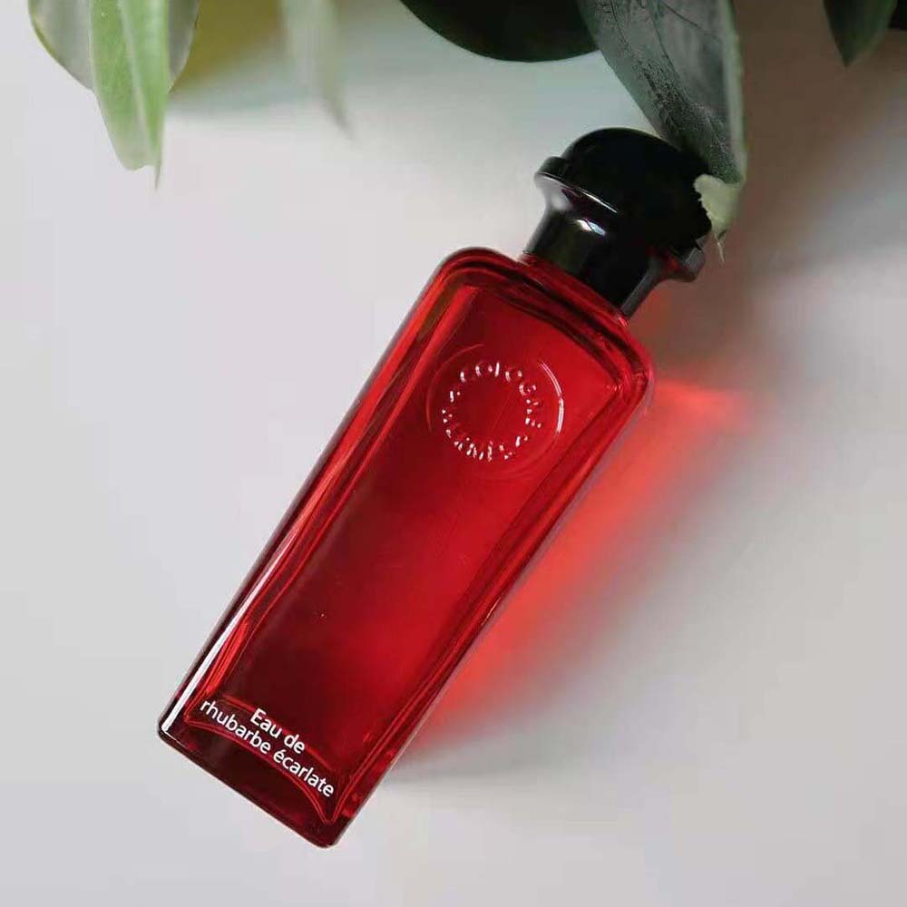 Side angle of elegant glass bottle Hermes Women Eau de Rhubarbe Ecarlate Eau de Cologne