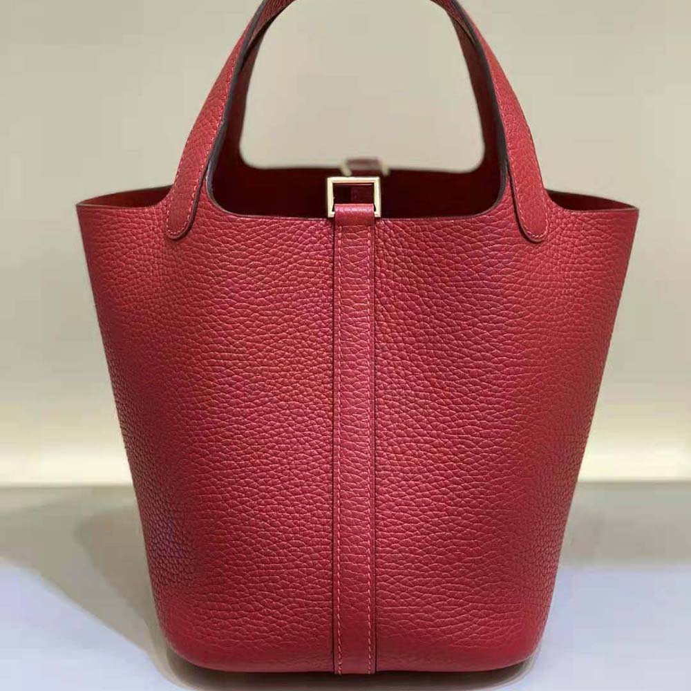 Close-up of polished lock detail on Hermes Picotin Lock 18cm red bag