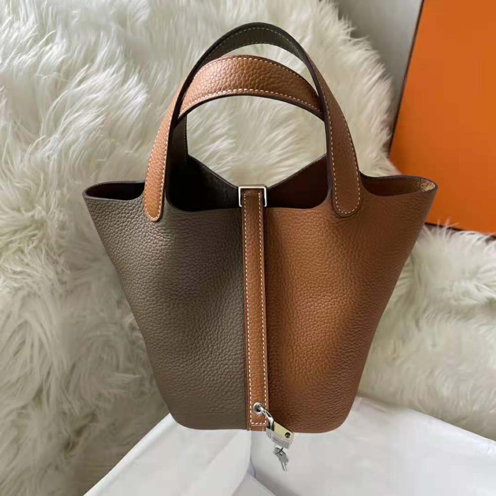Close-up of signature lock on Hermes Women Picotin Lock 22cm handbag