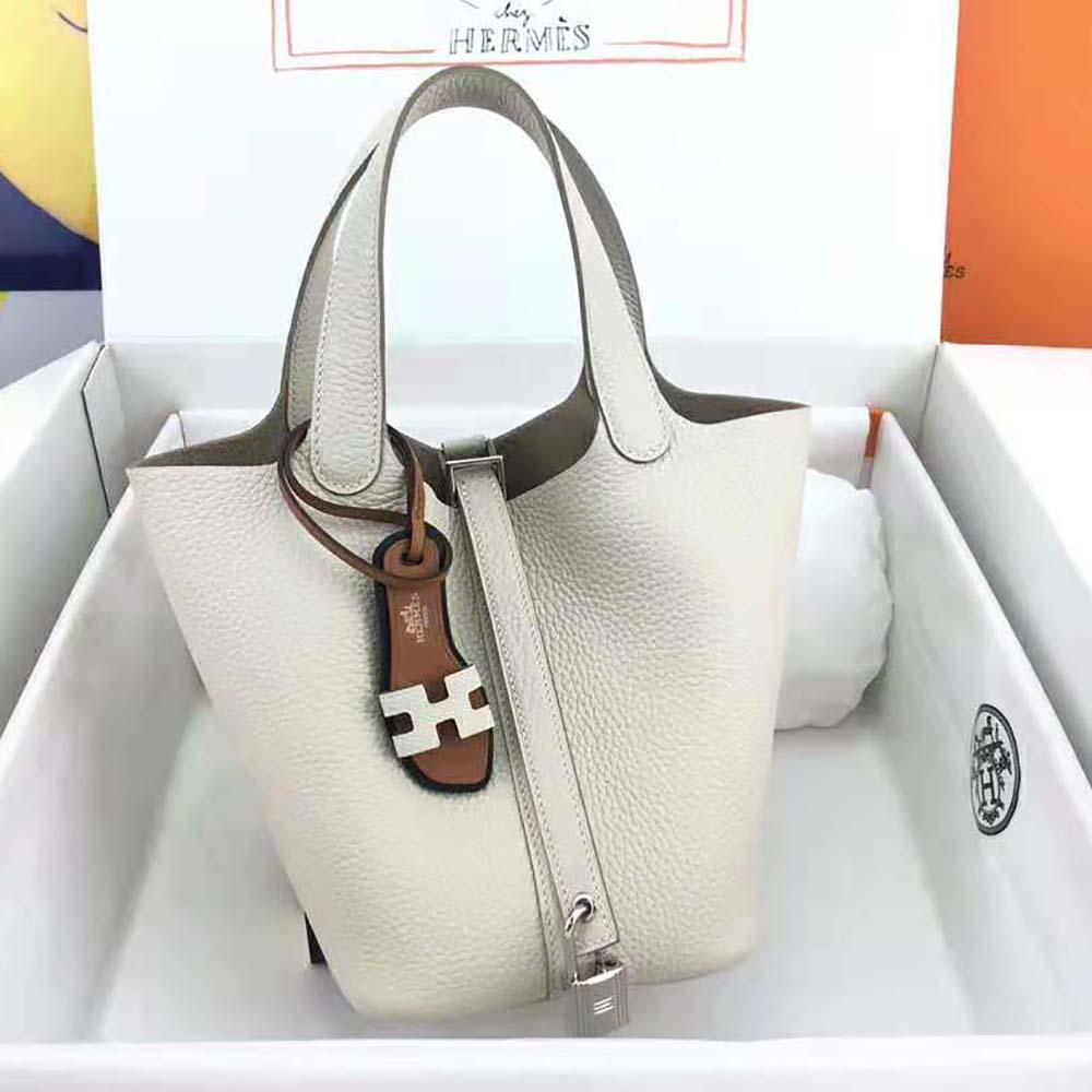 Side angle showing texture of Hermes Women Picotin Lock 22cm White leather