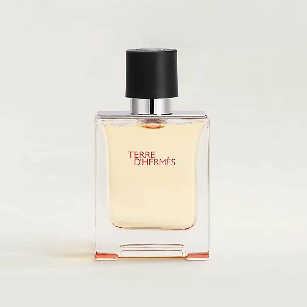 Front view of Hermes Women Terre D’hermes Eau de Toilette gold bottle