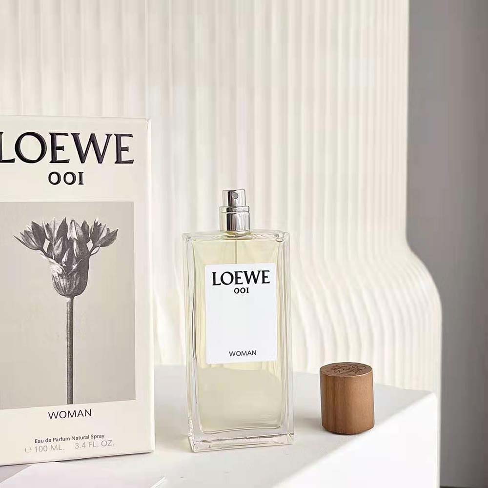 Side angle showing minimalist design of Loewe 001 Woman Eau de Parfum bottle