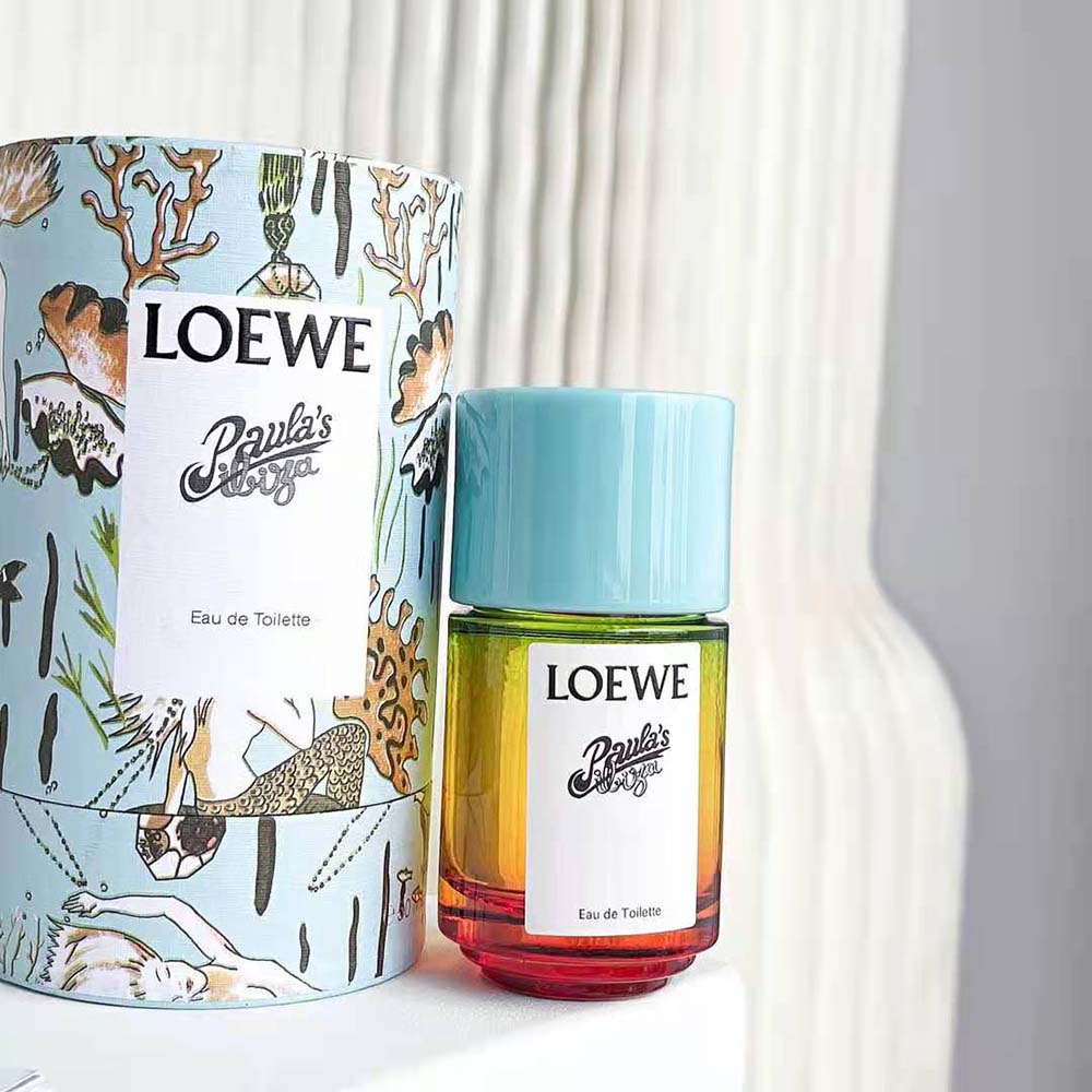 Loewe Women Paula’s Ibiza Eau de Toilette 50ml displayed with summer accessories