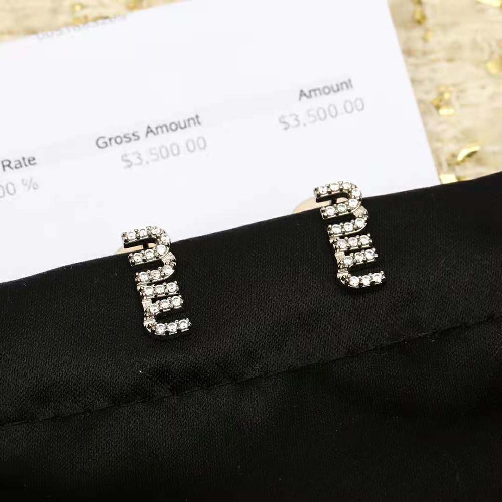 Side angle of Miu Miu Women Metal Earrings with Crystals displaying push-back closure