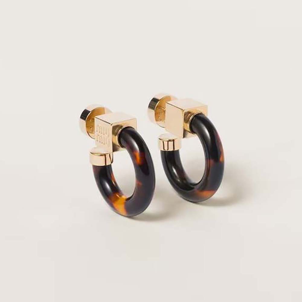 Front view of Miu Miu Women Plexiglas and Metal Earrings in brown