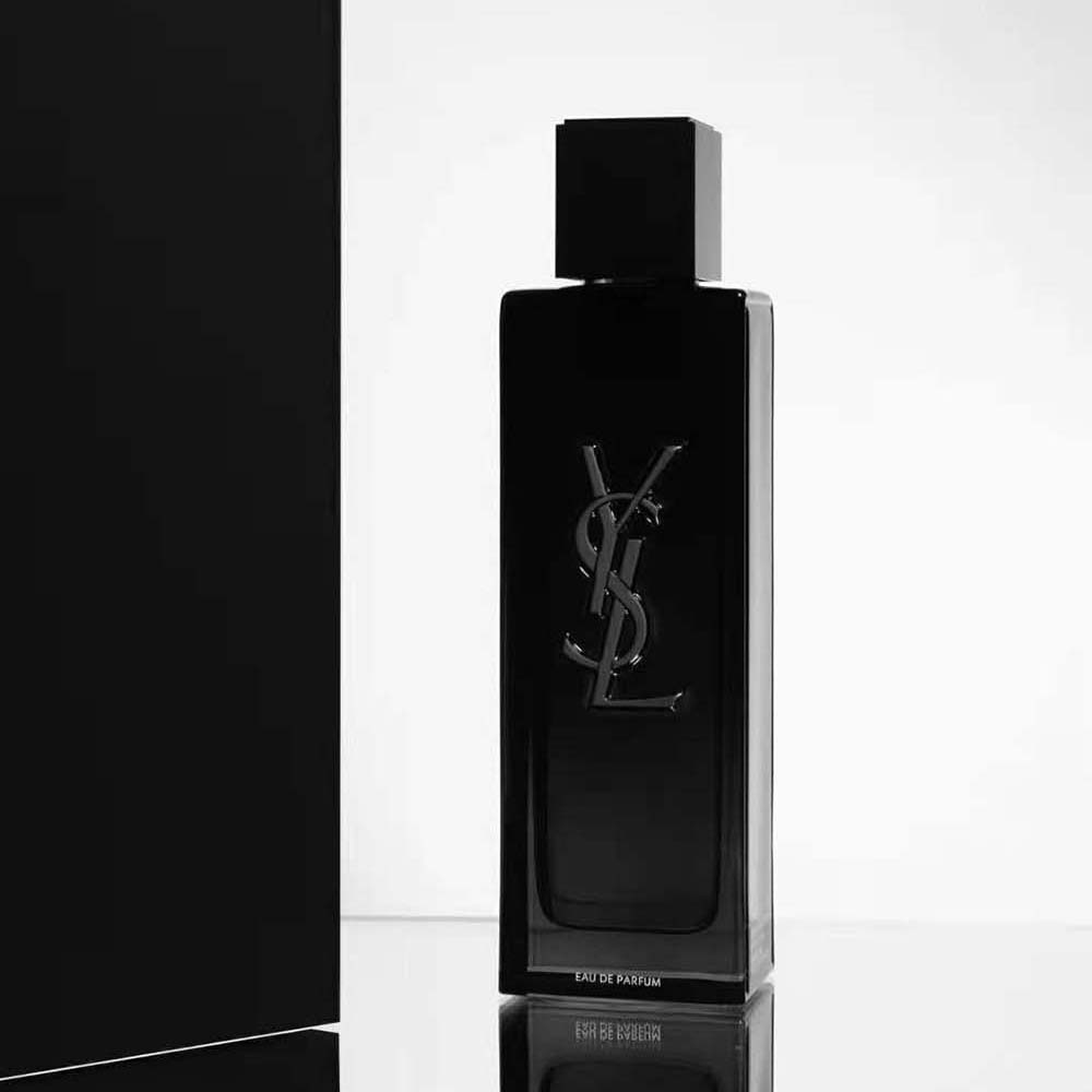 Close-up of silver YSL logo on Saint Laurent YSL Men Myslf bottle