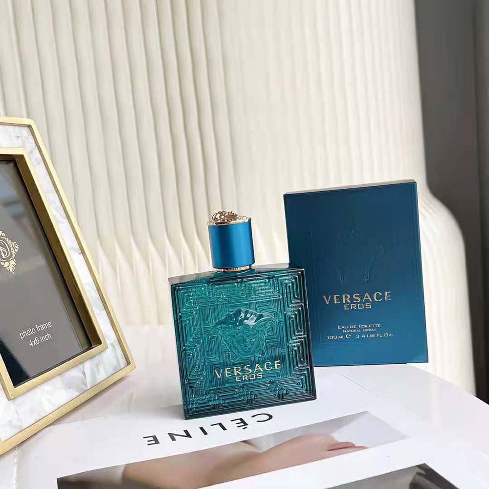 Close-up on Versace logo embossed on Eros Parfum bottle